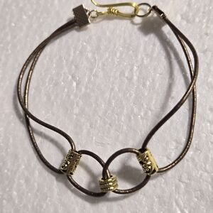 Hand Crafted Elegant Gold and Brown Bracelet
